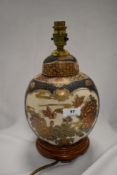 A modern Chinese style table lamp in the form of a ginger jar.