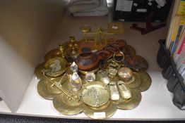 A collection of brass wares including a post office scale set, A scalloped Indian tray and a