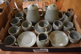 A mid century Prinknash part tea service in a mottle green glaze.