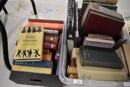 A carton of books of various topics including 'Natural Disasters' by Robert Coenraads. England In
