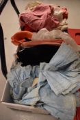 Two boxes of assorted textile fabrics and cloths