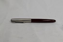 A Parker 51 aeromatic fill fountain pen in burgundy with lustiloy cap. Approx 13.8cm in very good