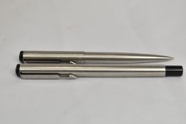 A Parker Rialto cartridge converter fountain pen and ball point pen in brushed steel. In very good
