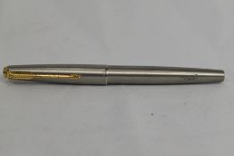A Parker 65 Flighter Deluxe aeromatic fountain pen in brushed steel with Parker 14k nib. Approx 13.