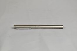 A Sheaffer Targa cartridge converter in brushed steel. In very good condition