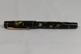 A Croxley 'The Croxley Pen' lever fill fountain pen in green black marble with single band to cap