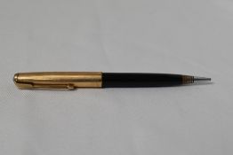 A Parker 51 propelling pencil in teal with lustraloy cap. In good condition