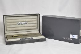 A boxed Parker Duofold Intentional MKII converter fountain pen in jade green with two bands to the