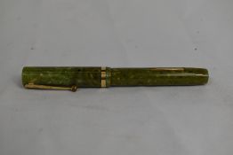 A Sheaffer Lifetime Flat Top lever fill fountain pen in jade with single broad band and white spot