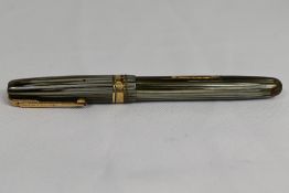 A Waterman W5 lever fill fountain pen in grey striated pattern having one broad and two narrow bands