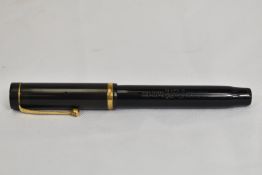 A Parker Duofold Senior Lucky Curve button fill in black with single band to the cap having Parker