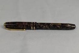 A Conway Stewart 24 lever fill fountain pen in red grey hatch with two narrow bands to the cap