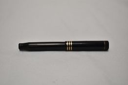 A Parker Duofold Jr Deluxe button fill in black with three bands to the cap having Parker Duofold
