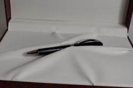 A Visconti Firenze small ballpoint pen in black marked Visconti to clip and band, in original box