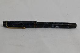 A De la Rue Onoto the Pen 5601 piston fill fountain pen in blue marble with single narrow band to