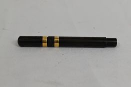 An Onoto ink pencil (stylo) in BHR with broad band to barrel and cap. Approx 10.4cm good condition