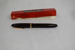 A boxed Mabie Todd & Co Swan leverless 4230 twist fill fountain pen in black with one broad and