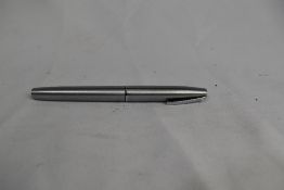 A Sheaffer 444 cartridge/ converter fountain pen in brushed steel with short clip and white spot