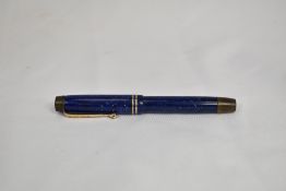 A Parker Duofold Jr Streamlined button fill fountain pen in lapis blue with two bands to the cap