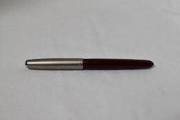 A Parker 51 aerofill fountain pen in burgundy with lustraloy cap. In good condition