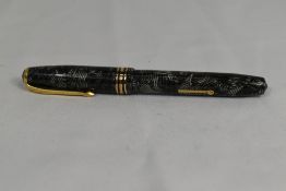 A Conway Stewart 58 lever fill fountain pen in silver grey hatch with single broad band and two