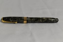 A Conway Stewart 60 lever fill fountain pen in silver grey hatch with single broad band to the cap