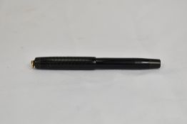 A Parker button fill fountain pen in BCHR with ring top to cap and having Parker 2 nib. In very good