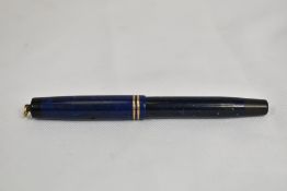 A Parker Duofold Lady button fill fountain pen in lapis blue with two bands and ring to the cap