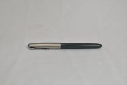 A Parker 51 aerofill fountain pen in navy grey with lustraloy cap. In good condition