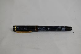 A De La Rue Onoto the pen 6233 plunger fill fountain pen in blue marble with two narrow bands to the