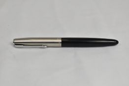 A Parker 51 aerofill fountain pen in black with lustraloy cap. In good condition