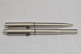 A Parker 25 Flighter converter fountain pen and ballpoint pen set in brushed steel. In good