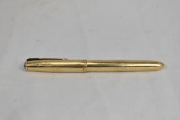 A Parker 51 Insignia aerofill fountain pen in gold filled. In good condition some small dings