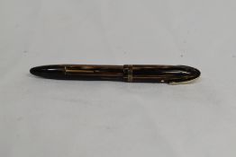 A Sheaffer Balance 1000 lever fill fountain pen in brown striated with single band to cap,