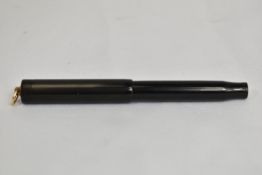 A Parker DQ button fill fountain pen in BHR with reeded design, ring top to cap and having Parker
