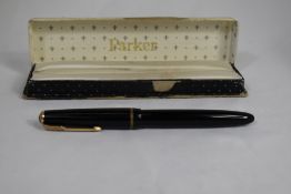 A boxed Parker Junior fountain pen in black. In good condition