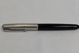 A Parker 51 aeromatic fill fountain pen in black with lustiloy cap. Approx 13.8cm in very good