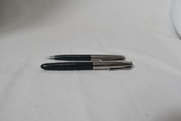A Parker 51 aerofill fountain pen and propelling pencil set in navy grey with lustraloy cap. In good