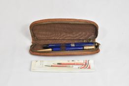 A cased Parker Duofold Lady Lucky Curve button fill fountain pen and propelling pencil in lapis blue