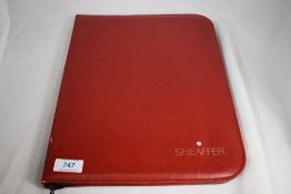 A soft Sheaffer pen folder, 48 slots in red