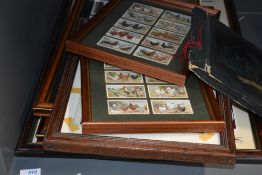 A collection of Cigarette Cards including framed sets of Reproduction Taddy & Co Railway Locomotive