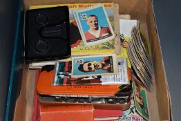 A collection of two Stamp albums, album of Trade Cards, Lexicon Card Game, Stereo Viewer, Football
