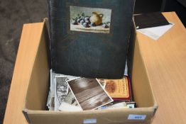 A box containing vintage Postcards in album & loose along with Cigarette Cards