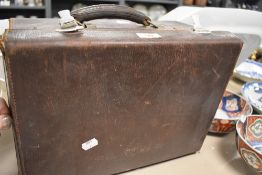 A vintage doctors box, having drawers, with partial contents of diagnostic set, stethoscope, boxed