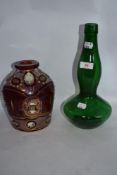 A Victorian ruby glass receptacle having gilt heightening and floral decoration and a green glass