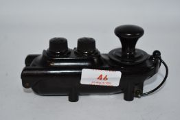 A Bakelite World War 2 British Army Morse code key.