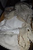 A box of mixed vintage and retro crotchet work, cloths, doilies etc to be included.