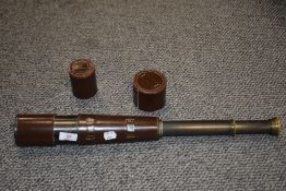 A leather clad telescope,'Broadhurst Clarkson and Co, LTD, 63 Farringdon Road, London, F.C'.