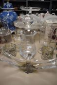 A collection of mixed vintage glass, including stirling silver overlaid items, two tazzas and art