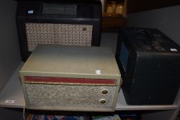 Two circa 1940s radios and a portable Philips record player.